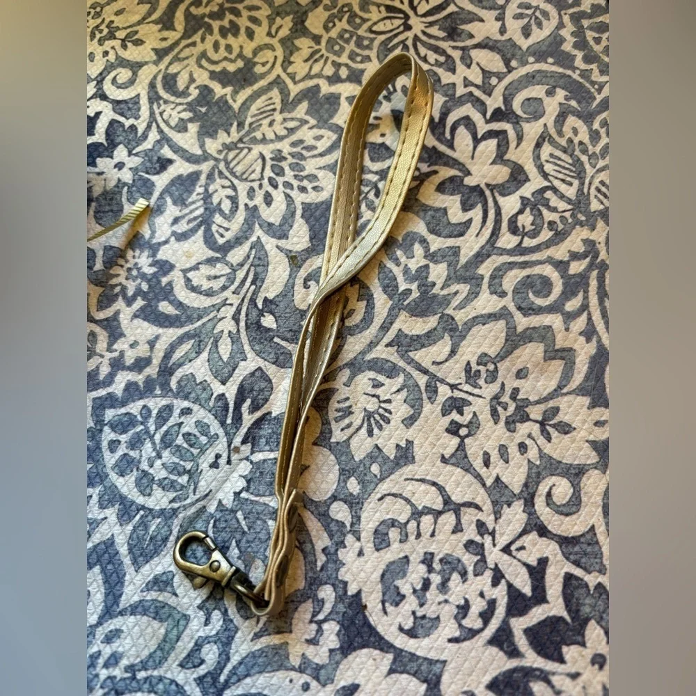 iPhone 16 plus Gold Wallet Phone Case with Crossbody and Wristlet Strap